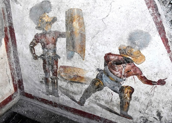 意大利庞贝古城考古公园北部酒室发现绘画角斗士战斗的壁画