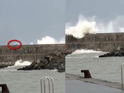 西班牙男子在海堤上慢跑时被突然出现的恐怖巨浪卷走 过程被民众拍下